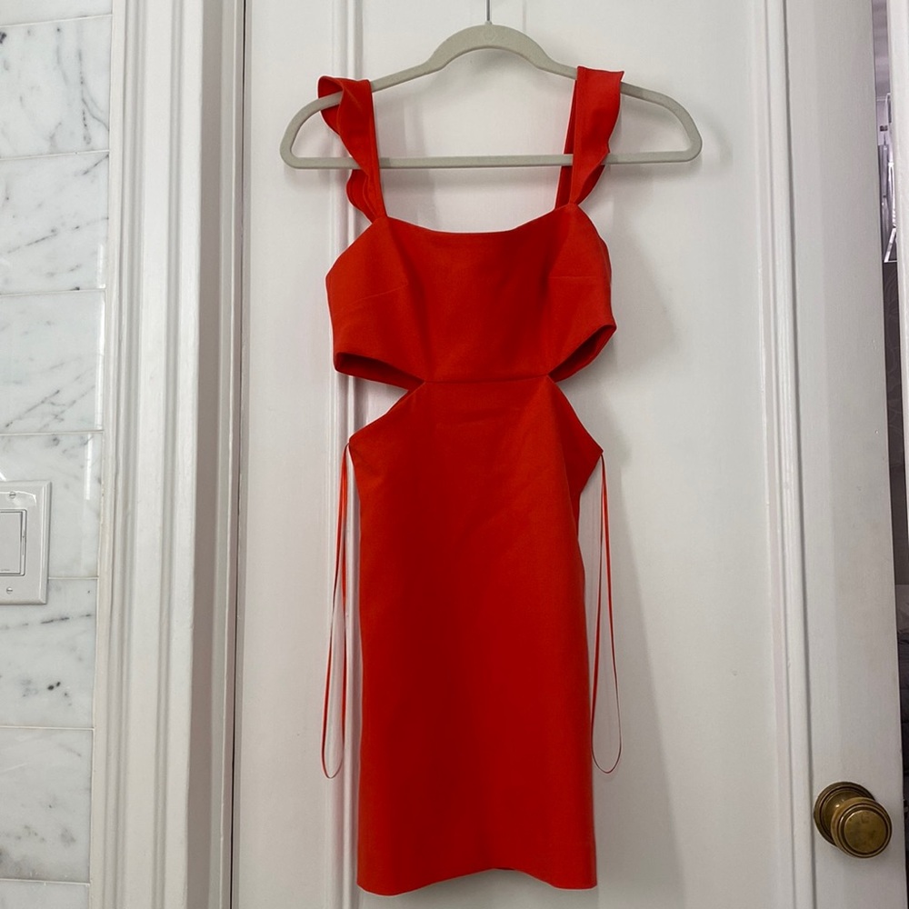 Likely red dress with cutouts, in perfect condition
